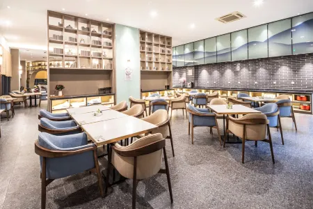 Scholars Hotel Отели в г. Суцянь