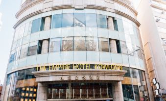 There is a large building with an oriental sign above its front entrance at Empire Hotel Kowloon－Tsim Sha Tsui