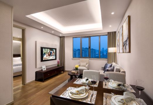 서머셋 에메랄드 시티 레지던스의 아늑한 침실 공간