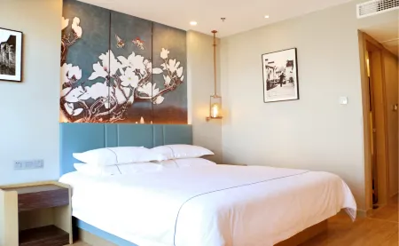 Magnolia Hotel (Hefei Lujiang County Inner Ring North Road) Отели рядом с достопримечательностью «Tomb of Zhou Yu»