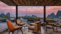 Yangshuo Percent Hotel  (West Street Li River)