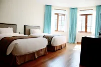 Nine Cloud Homestead Resort Hotel فنادق في تونغ لو