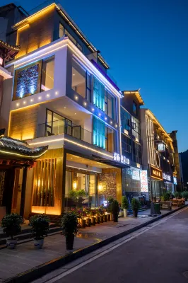 Xijian Liangshe Vacation Guesthouse - ที่มีบาร์