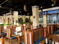 Hulega Hotel (Yining Kazanqi Street Branch) فنادق في إي نينغ