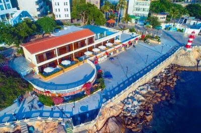 Yangcheng Hotel Отели рядом с достопримечательностью «Остров Носа.»