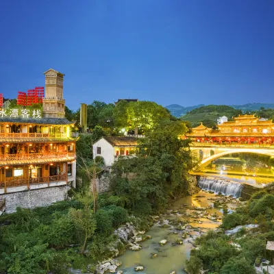 Baishuitan Inn (Furong Town Waterfall Branch) Hotels near Yinan Square
