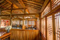 Puzhehei Riverside Inn - Parkplatz