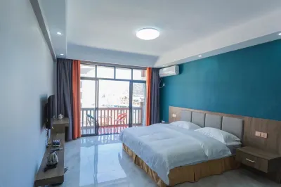 仁尊客棧 軍聲砂石畫文創園附近的飯店