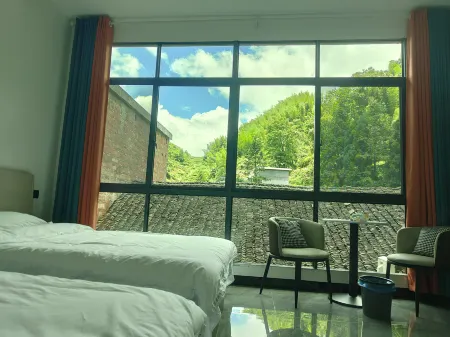 Yunjian Yishui Homestay Отели рядом с достопримечательностью «Yangtianhu Grassland»