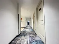 Pebble Motel (Jingjiang Renmin Road International Trade Center)