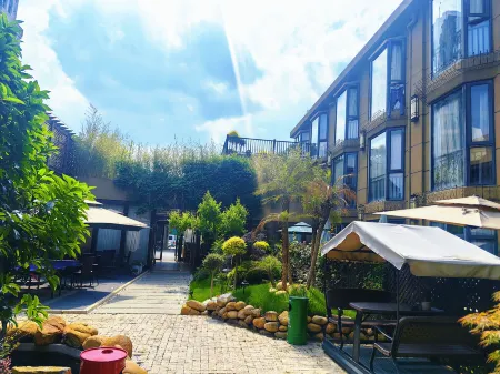 Huamei Shilan She Отели рядом с достопримечательностью «Shanghai Industry and Commerce Foreign Language College South Campus»