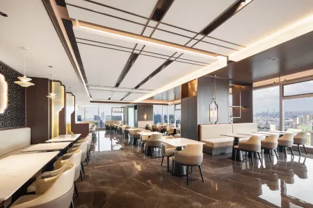 Yilong International Hotel  (Shenyang Qingnian Street Jinlang Plaza) Отели рядом с достопримечательностью «Northeastern University»