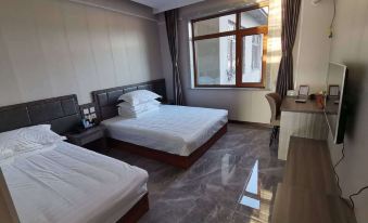 Wafangdian Xinyue Business Hotel