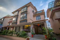 Floral Hotel Man juShiguang Отели в г. Южный вход в живописный парк / городок Manyou / перевал Nanyuan