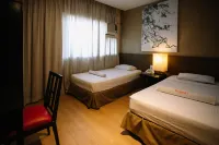 Dynasty Tourist Inn - parkir