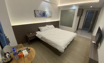Ru'an Business Apartment (Raoping Qiandongzhen Branch)