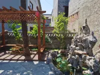 Jinzhuyuan Homestay Отели рядом с достопримечательностью «Автобусная станция Ичуань»