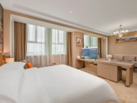 Vienna Hotel (Cele) Hotels in Qira