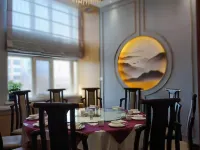 Qiu Lin Hotel (Bo Le Shopl) Hotels in Börtala