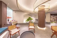 Mengjing Shangpin Hotel (Xishuangbanna Jinghong Poshuiguangchang Square)