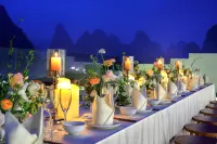 Yangshuo Antiya Hotel (Yulonghe Shili Gallery Store)