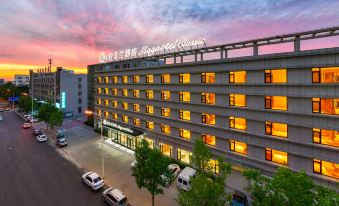 Magnolia Business Hotel ( Dalian Jinzhou Hengda Garden)