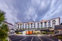Dehong Mangshi Yasifeier Hotel - parcheggio