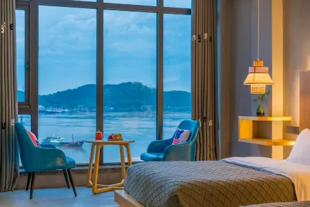 Xilange Guesthouse Отели рядом с достопримечательностью «Huangcheng Beach»