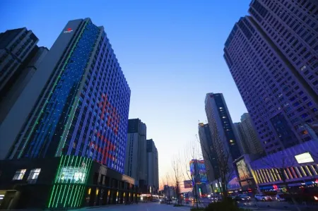 Orange Peninsula Hotel (Zhangzhou Zhongxu Square) Отели рядом со станцией Pizhoudong Railway Station