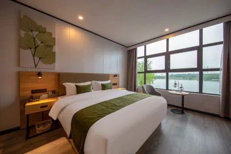 GreenTree Zhixuan Hotel (Taixing Huangqiao Town Qinhugang Plaza) Отели рядом с достопримечательностью «Huangqiao Ancient Town»