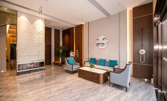 Xinyi Hotel (Neijiang High-Speed Railway North Station Normal College)