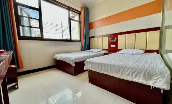 Zhoukou Kaixinyuan Hotel (Baicheng Railway Station)