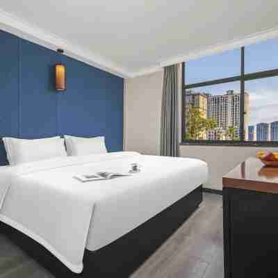 上高新名典ホテル(敖山大道鏡山広場) Rooms