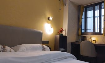 Aihaomei Self-Service Hotel (Lingang Equipment City Guanshan Yue)