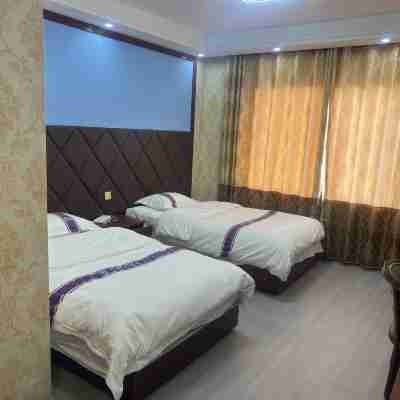 八宿邦達毛哥大酒店 Rooms