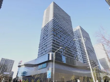 Geeky Apartments Отели рядом с достопримечательностью «Changchun Workers Gymnasium»