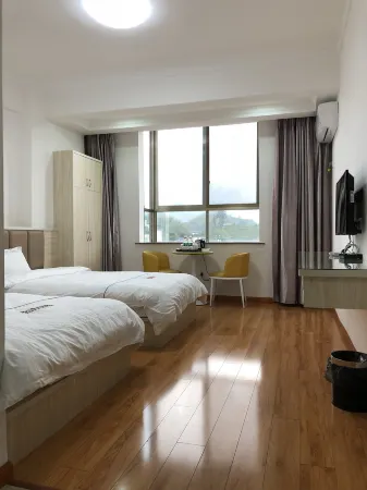 Holiday Hotel Zhenghe Ancient Town Отели в г. Цженхэ