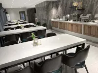 Luxi New Oasis Hotel - فطور