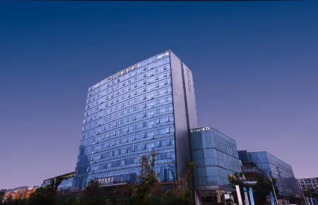 ZhuJi MuChen Hotel (YongLi Square Store) Отели рядом с достопримечательностью «Zhuji Gymnasium»