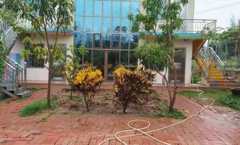 Xuwen Jiaoweixiang Nanyuan Homestay