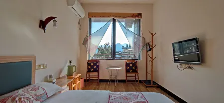 Xunmeng Huizhou Inn Отели в г. Цзиси