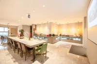 Meiyi Hotel (Zhangjiagang Jinfeng Shagang Branch)