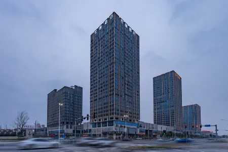 Xinxi Hotel (Jingzhou High Speed Railway Station Fangte Branch) Отели рядом с достопримечательностью «Guan Yu Memorial Temple»