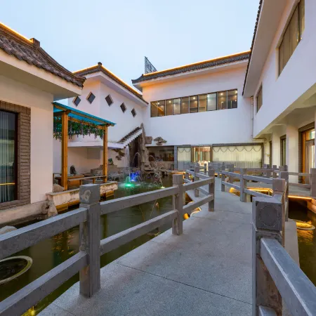 Taibai Restaurant Boutique Garden Hotel (West to Jining North Bus Station)