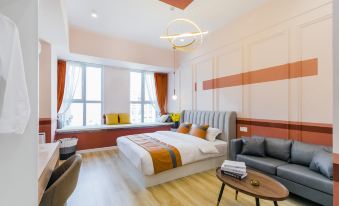 Xinju Sense Apartment (Qingdao Lanshan Bay)