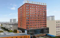 Vienna International Hotel (Zhaotong Wuyue Plaza) Отели рядом с достопримечательностью «Спортивный стадион Юябаошана»
