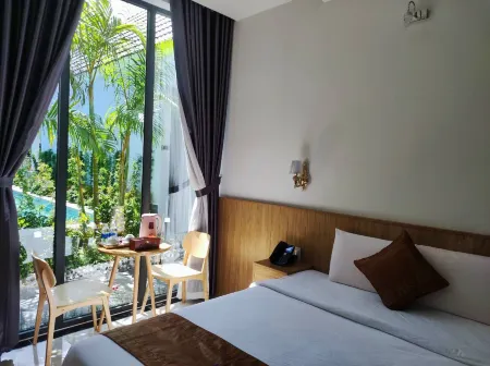 Ngoc Trai Xanh Bungalow Отели рядом с достопримечательностью «Ho Quoc Temple»