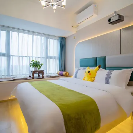 Xiyue Movie Hotel (Xingyang Wuyue Plaza Zhengzhou West Railway Station)