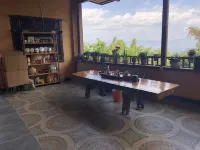 Lancang Yuercha Chinese Inn (Jingmaishan Ancient Tea Forest Scenic Area)