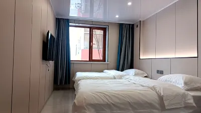 Muming Erlai Homestay Hotels near Mohe Railway Station